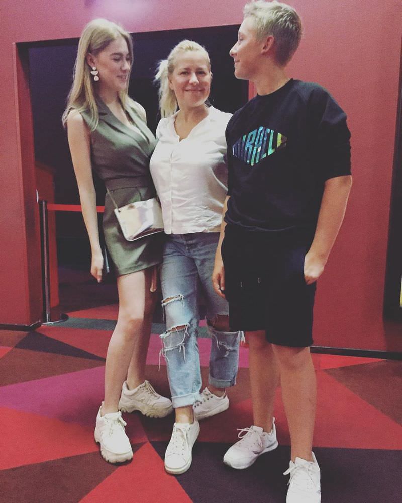 Daria Filippova with her mother and brother