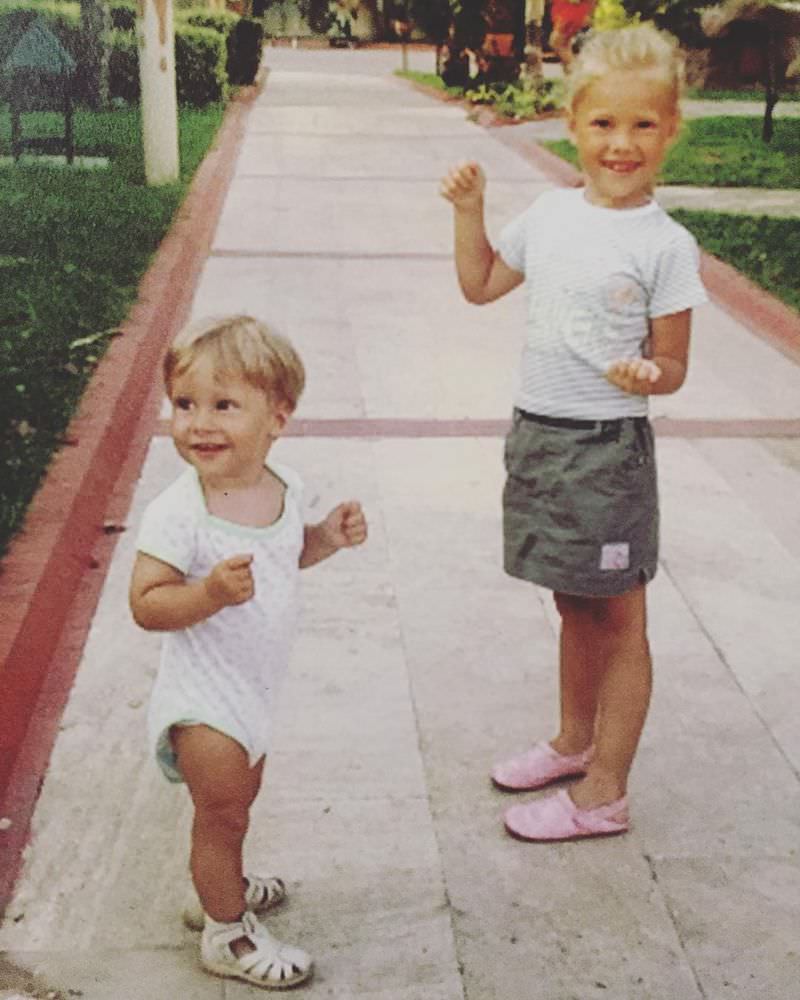 Daria Filippova in her childhood with her brother