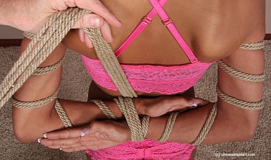 girl with hands tied