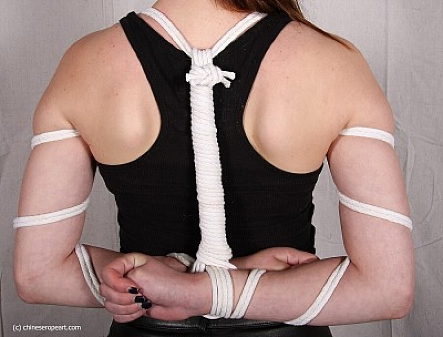 girl with hands tied