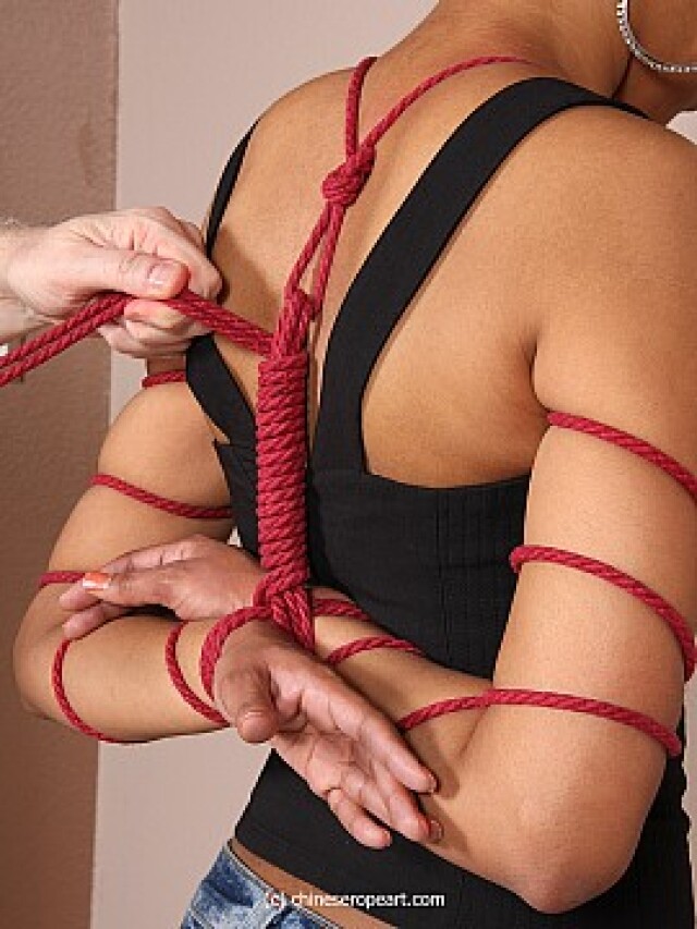 girl with tied hands